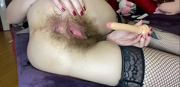  Hairy girl fucks her wet big clit pussy with dildo in close up